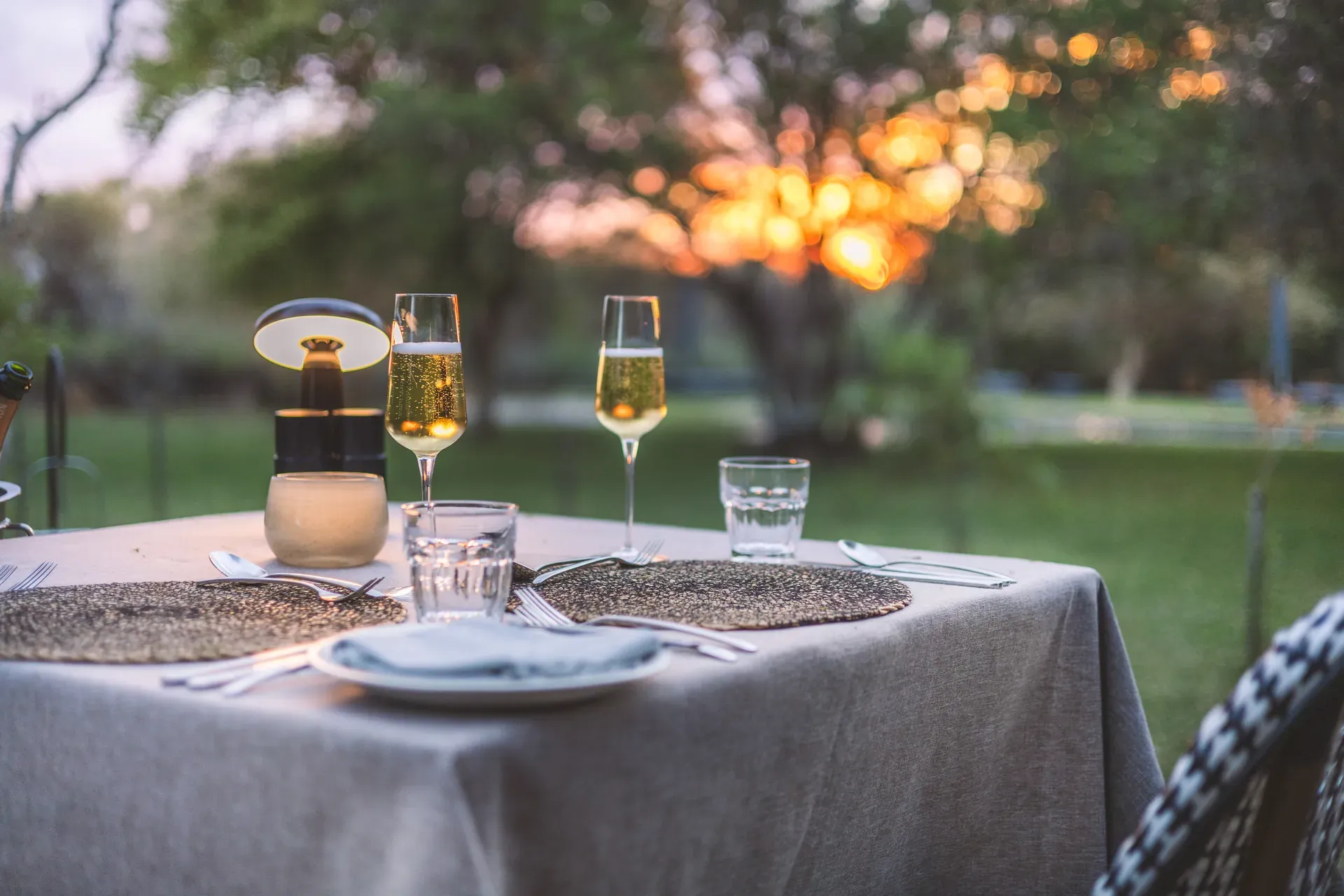 Guests enjoying champagne sundowners.