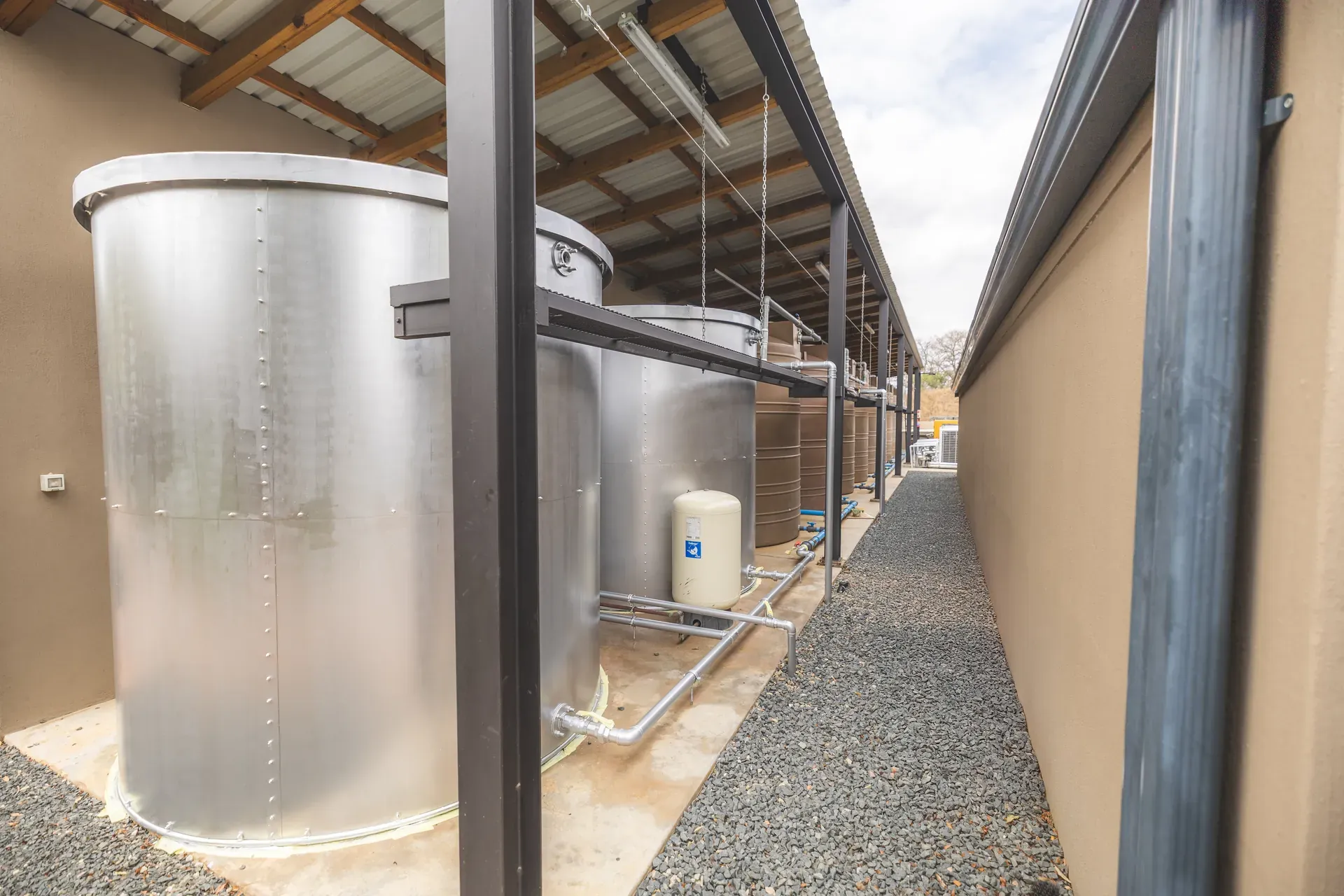 Water tanks at Monwana Lodge used for greywater recycling as part of the lodge’s water conservation efforts.