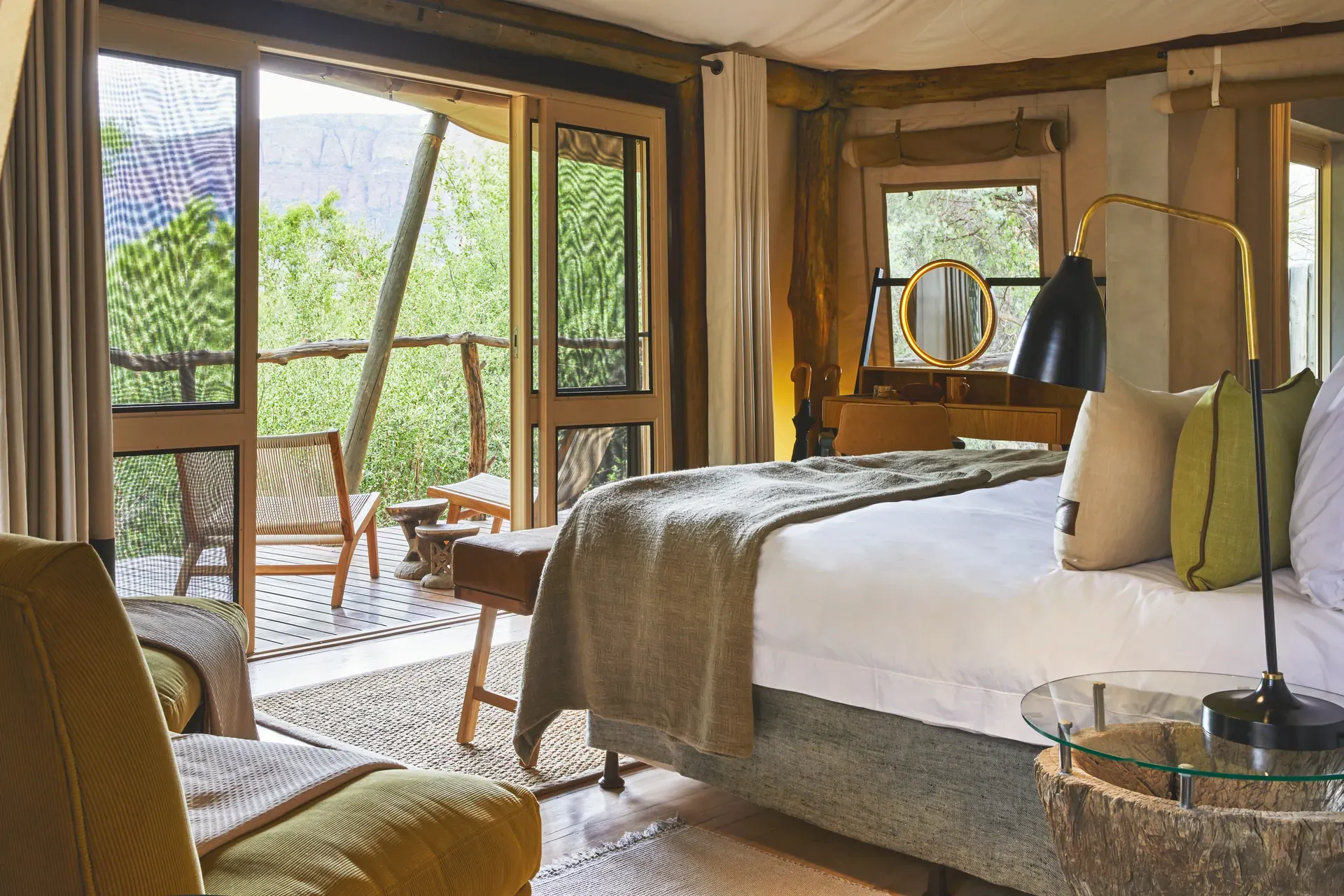 Marataba Safari Lodge – Luxury Tent bedroom with veranda, seating area, and bush views.
