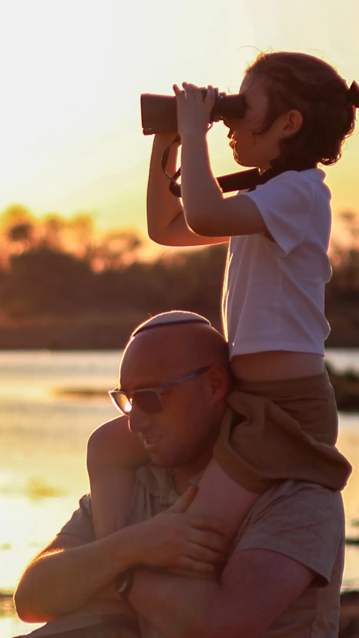 Child with binoculars