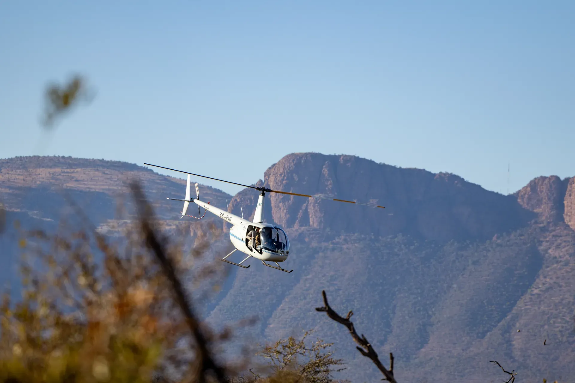 Marataba – Helicopter in the sky as part of the Rhino Conservation program.