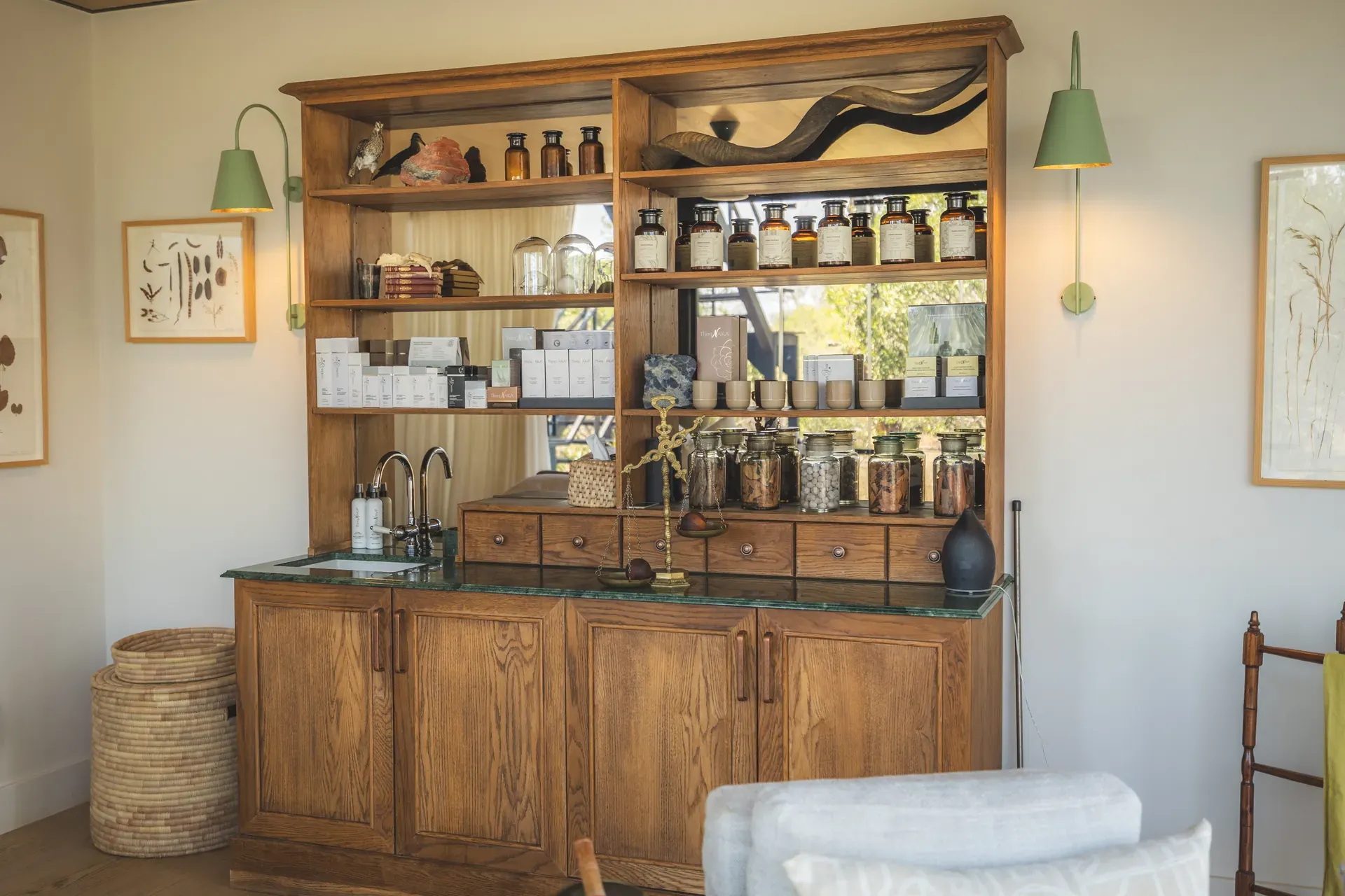 Spa treatment shelf at Monwana displaying an array of wellness products.