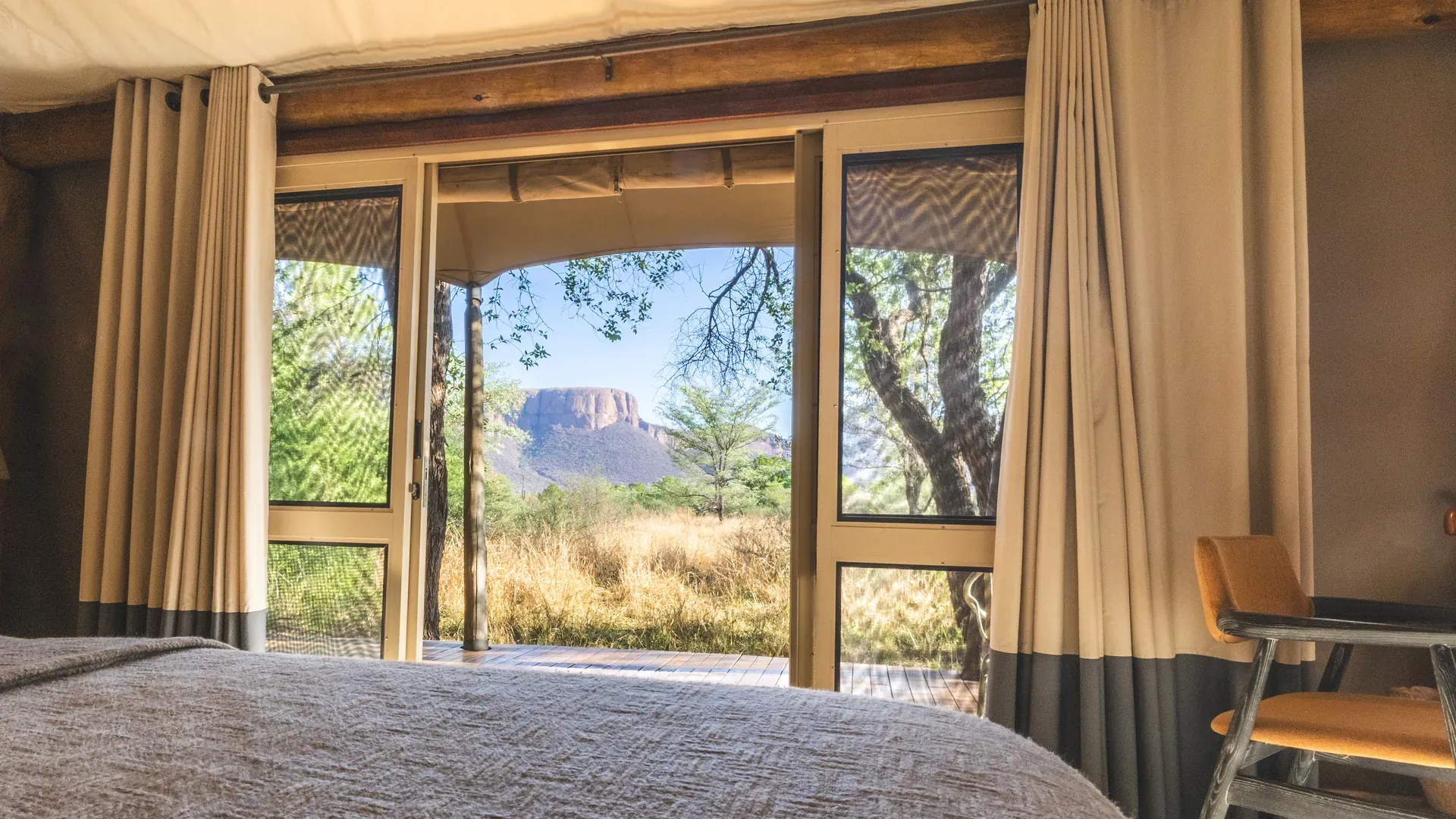 Marataba Safari Lodge – Family Tent Suite with view of bush and mountain.